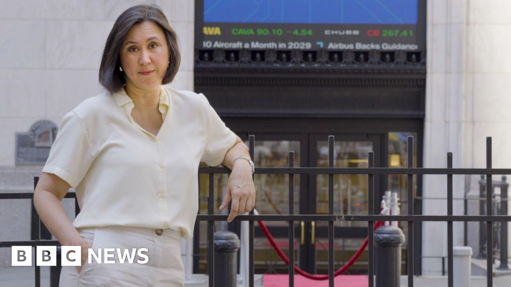 Michelle Fleury is talking to the camera in New York City.
