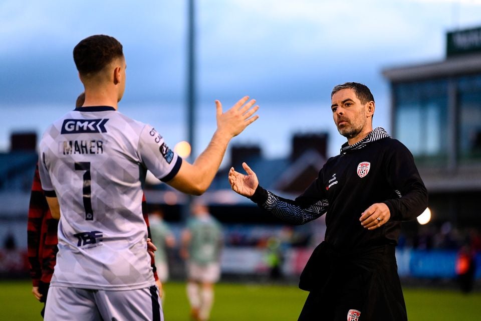 Derry City boss Tiernan Lynch congratulates goalkeeper Brian Maher following his side's victory over Treaty United