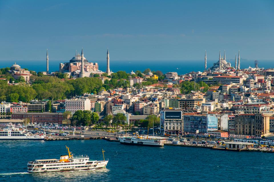 Istanbul skyline with ferries on the Bosphorus Strait.