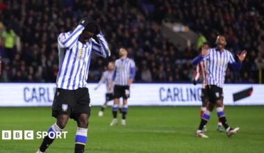 Djeidi Gassama with his head in his hands while playing for Sheffield Wednesday