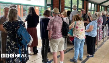 A queue of ticket-holders for the event at the Meadowhall Interchange coach station.