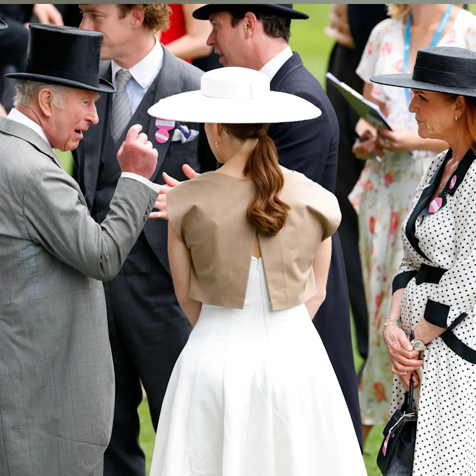  King Charles, Sarah Ferguson and Princess Eugenie talking at Royal Ascot. 