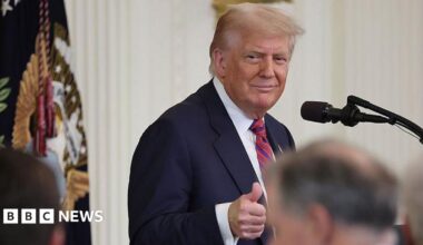 Trump gives a thumbs up at a bill signing ceremony on Friday.