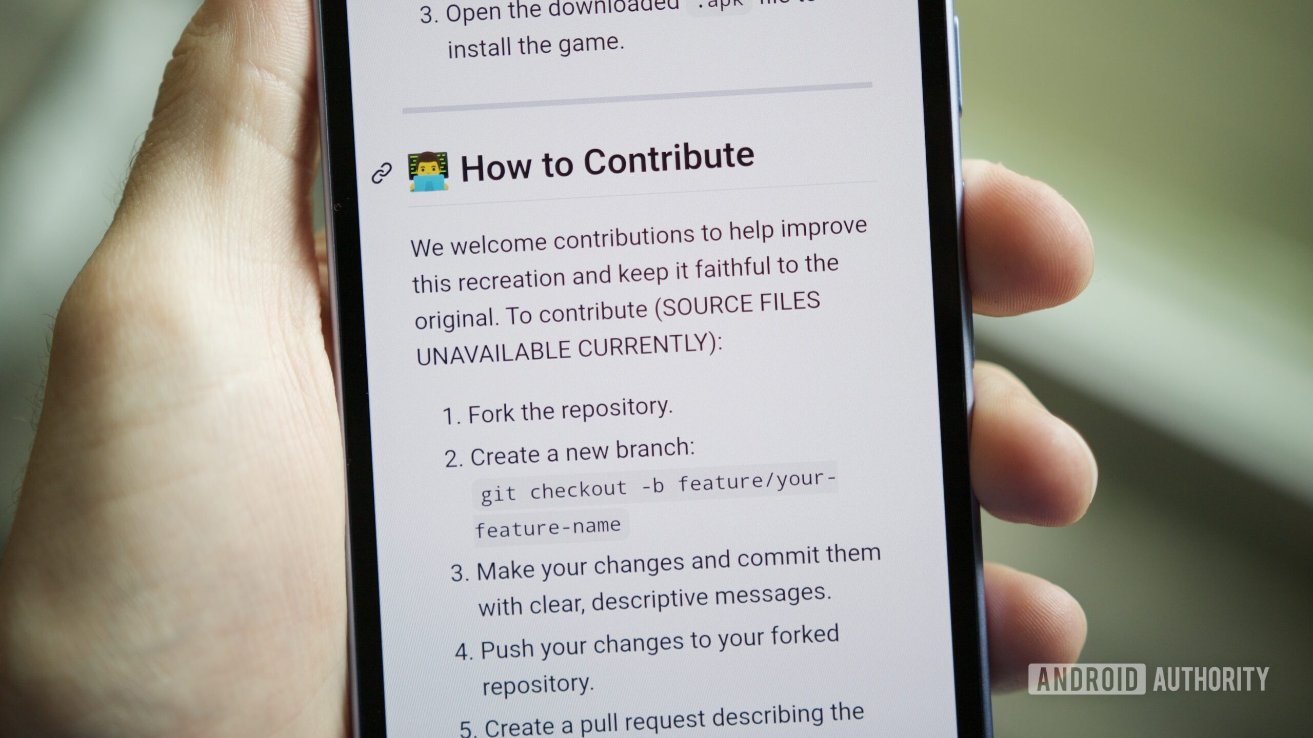 The GitHub page for the 64-bit Flappy Bird recreation, displayed on an Android phone.