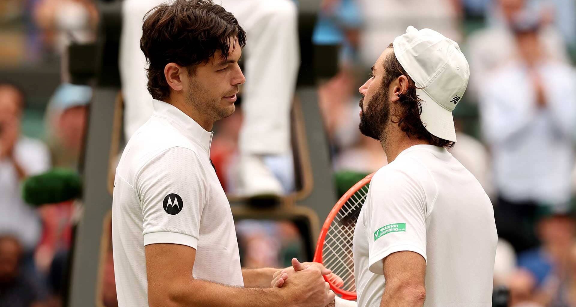 Taylor Fritz and Jordan Thompson share words on Sunday at Wimbledon.