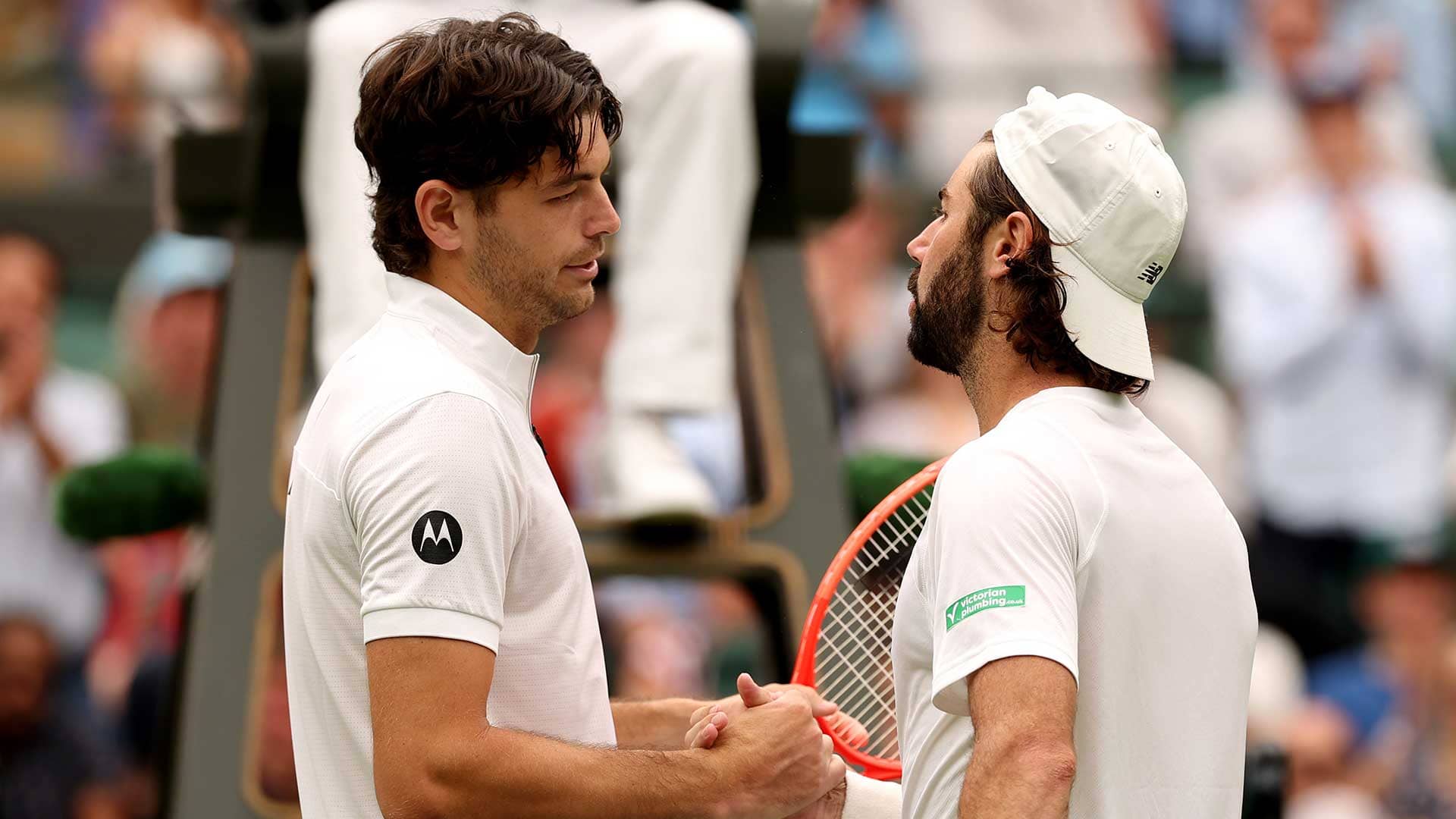 Taylor Fritz and Jordan Thompson share words on Sunday at Wimbledon.
