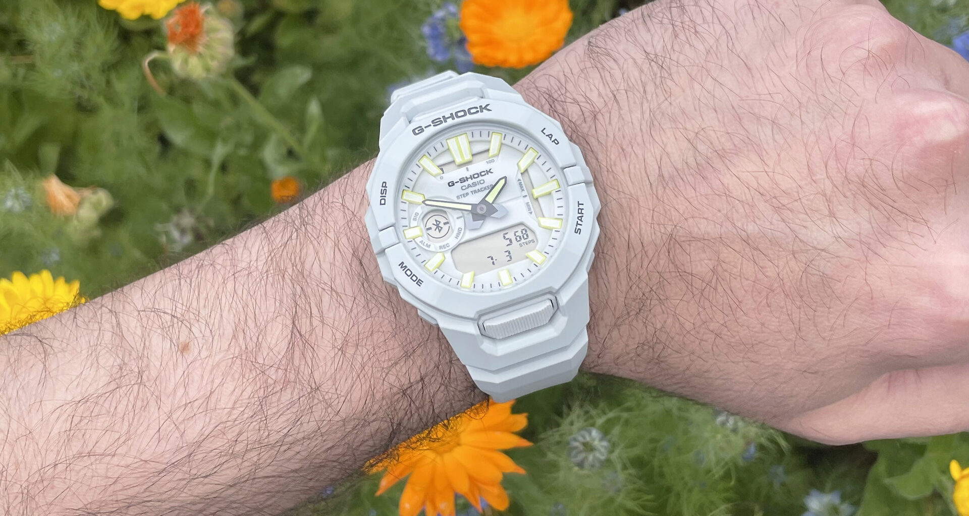 Close-up of the Casio G-Shock Move GBA950 fitness-tracking smartwatch on the writer's wrist