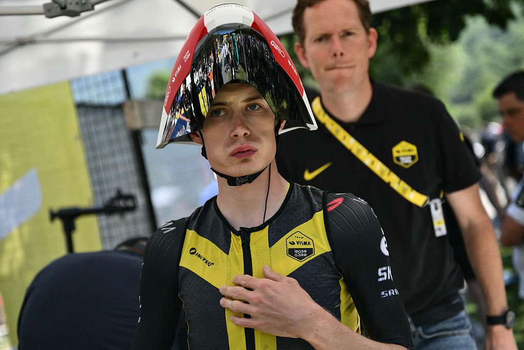 Team Visma - Lease a bike team's Danish rider Jonas Vingegaard awaits the start of the 13th stage of the 112th edition of the Tour de France cycling race, 10.9 km individual time trial between Loudenvielle and Peyragudes, in the Pyrenees mountains of southwestern France, on July 18, 2025. (Photo by Marco BERTORELLO / AFP)