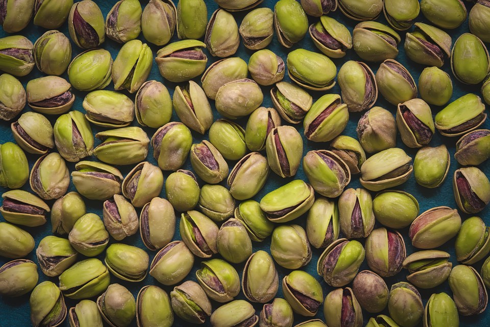 High-resolution photo of many pistachios.