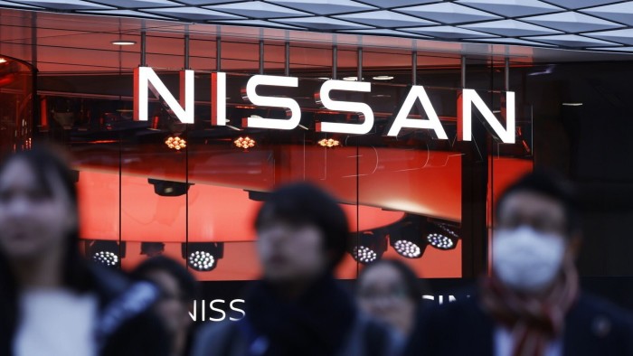 Signage displayed at Nissan Motor Co.’s Ginza showroom in Tokyo, Japan