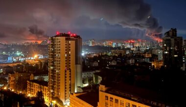 Kyiv at night with smoke rising after a missile strike
