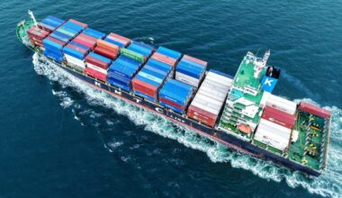 A cargo ship loaded with containers leaves the port in Qingdao, eastern China