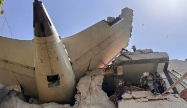 The tail of Air India Flight 171 after it crashed into a residential area near the airport in Ahmedabad, Gujarat, on June 12