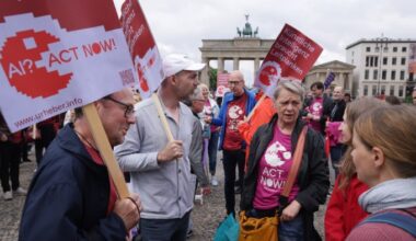 Members of an authors’ rights group call for AI regulation at a rally in Berlin. To date, regulators and lawmakers have failed to grasp the full dimensions of the challenge