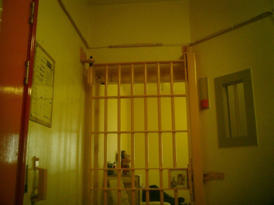 Interior view of a prison cell.