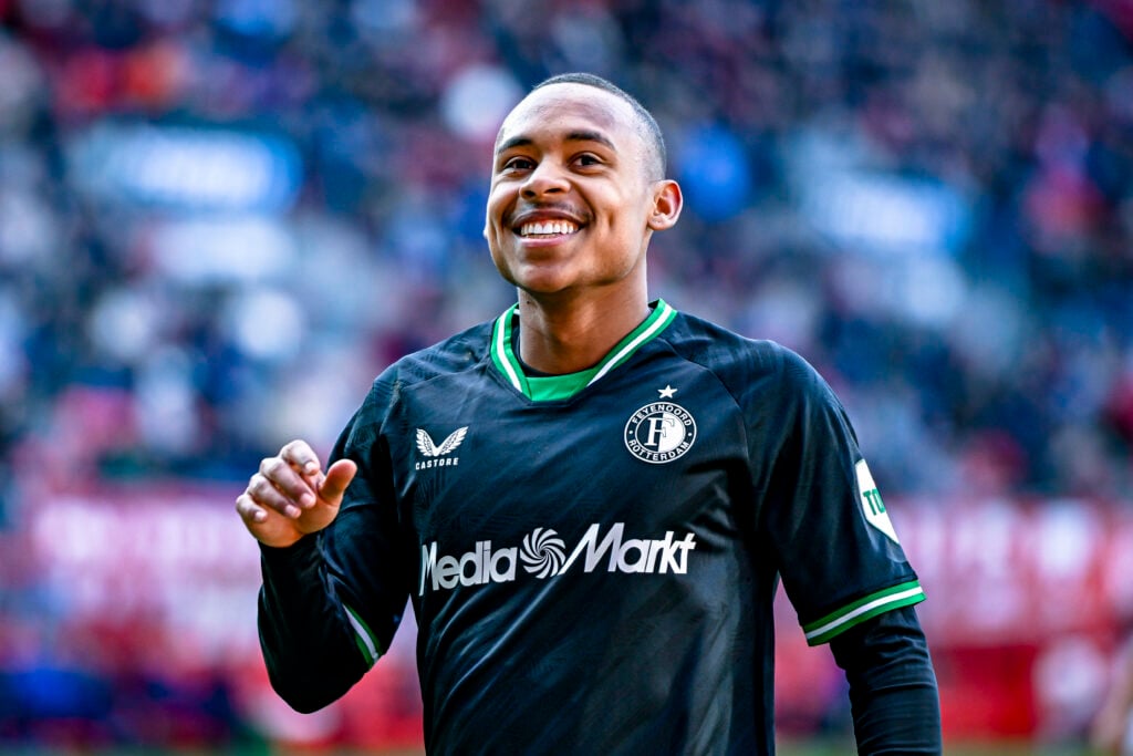 Igor Paixao smiles while in action for Feyenoord