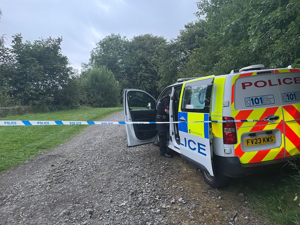 Police van at a crime scene in Glasgow Necropolis.
