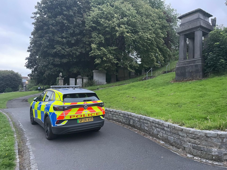Police car in Glasgow Necropolis.