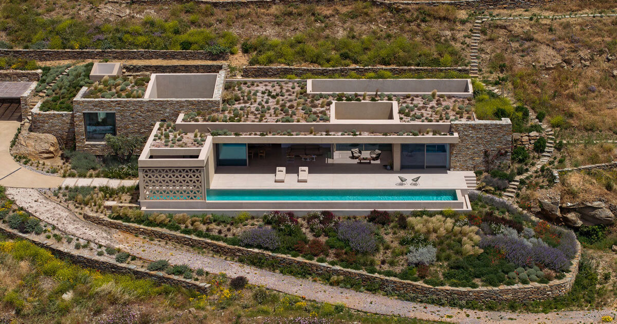 katerina valsamaki embeds subterranean house into hillside slot in tinos