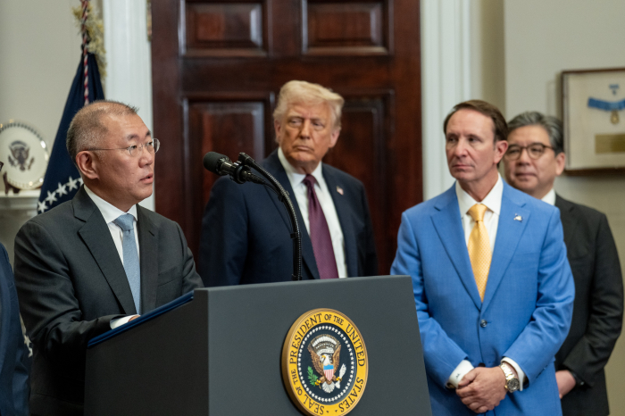 In March, Hyundai Motor Group Chairman Chung Euisun (left) announced a plan to invest  billion in the US