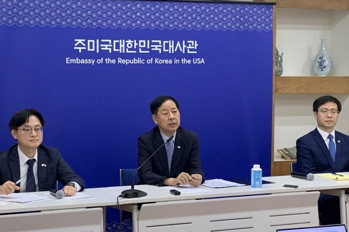Koo Yoon-cheol, South Korean deputy prime minister, speaks at a press briefing on Washington DC on July 30