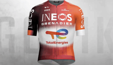 A computer generated image of Ineos Grenadiers' new jersey, an orange design with a white fade area showing the TotalEnergies logo