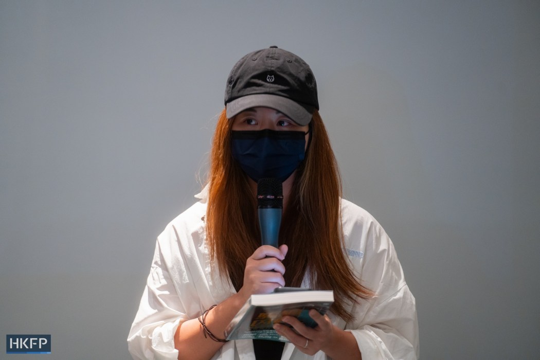 "Wendy" speaks at a launch event or ex-district councillor Andy Yu's book on Myanmar scam compounds, on July 5, 2025. Photo: Kyle Lam/HKFP.