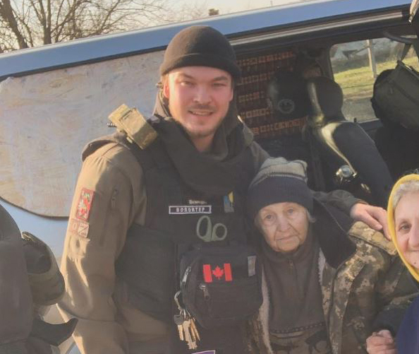 Calgarian Paul Hughes, whose son MacKenzie is seen helping deliver humanitarian aid along the front lines of the war in Ukraine, said he is inspired by the bravery of the Ukrainian people.
