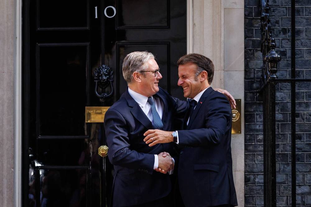 France and U.K. Sign Deals on Migration, Nuclear Weapons