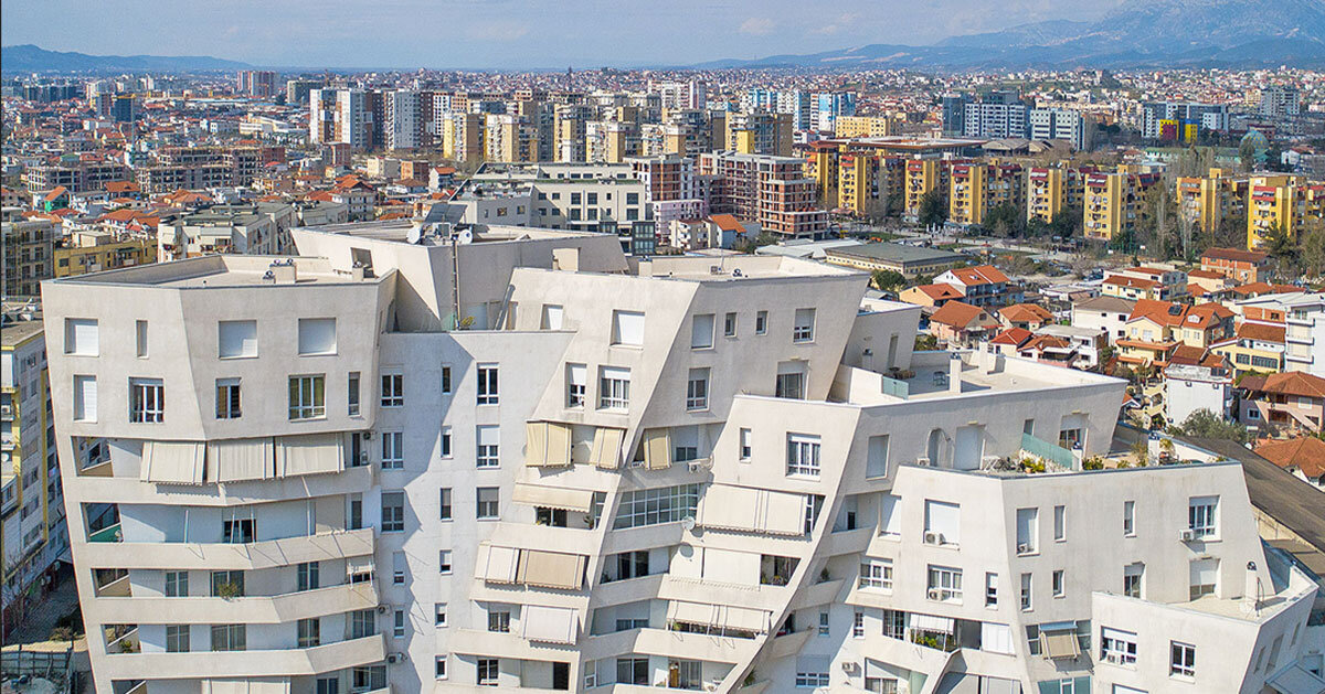 studio libeskind & kontakt weave public gardens through curved residences in tirana