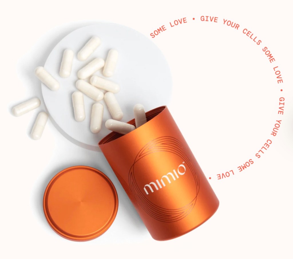 Mimio supplement capsules spilling from an orange container