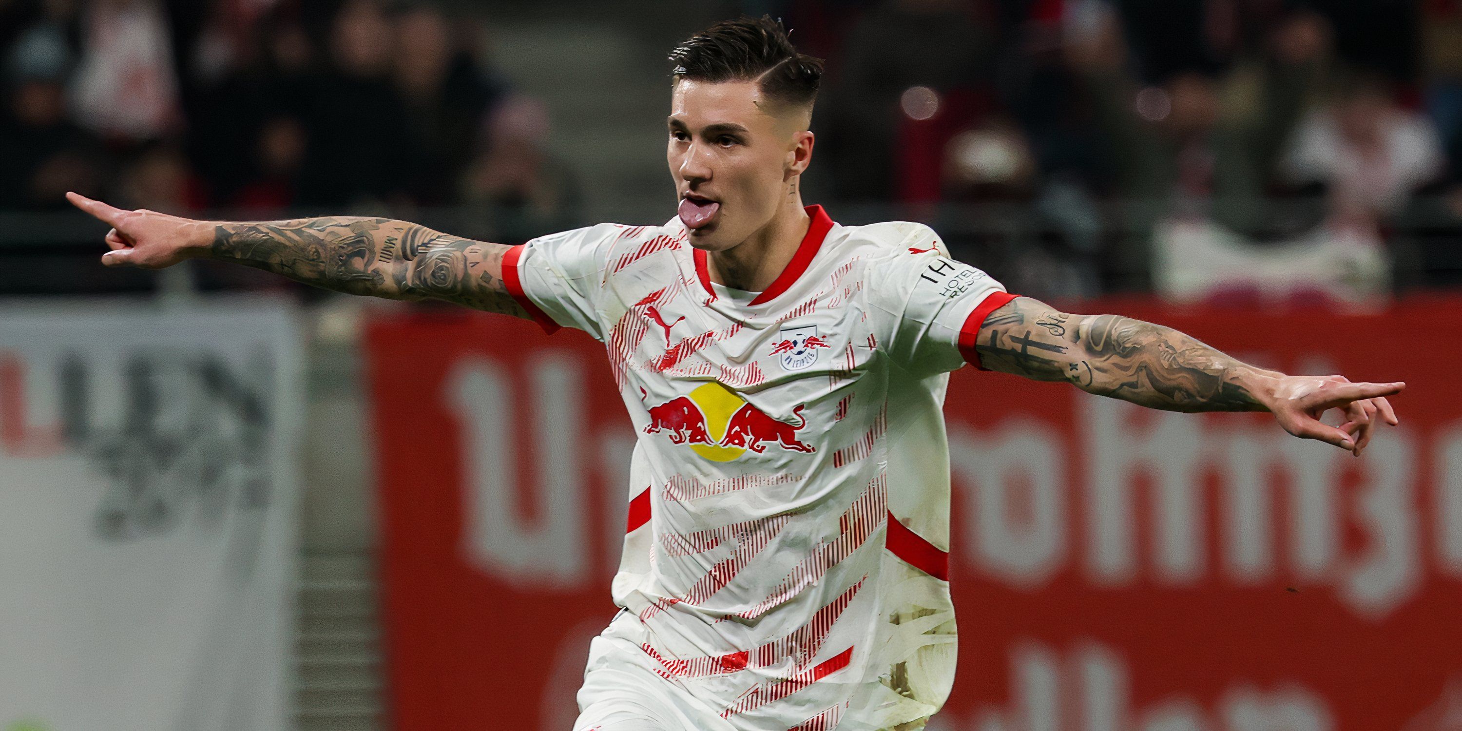 Benjamin Sesko celebrating after scoring for RB Leipzig