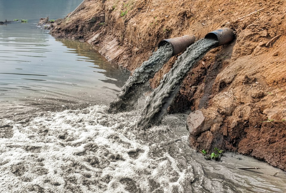 Industrial wastewater polluting a river.