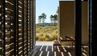 olson kundig frames new zealand coast with modern beach house