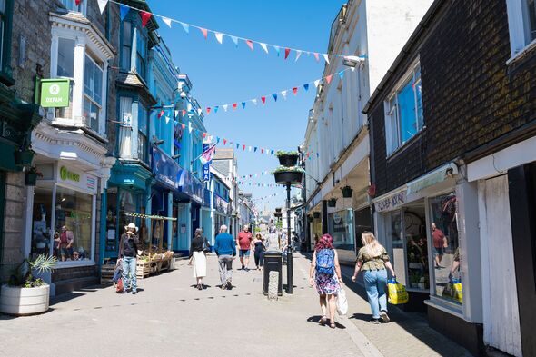 People on the streets in Penzance, Cornwall, South West England, United Kingdom.