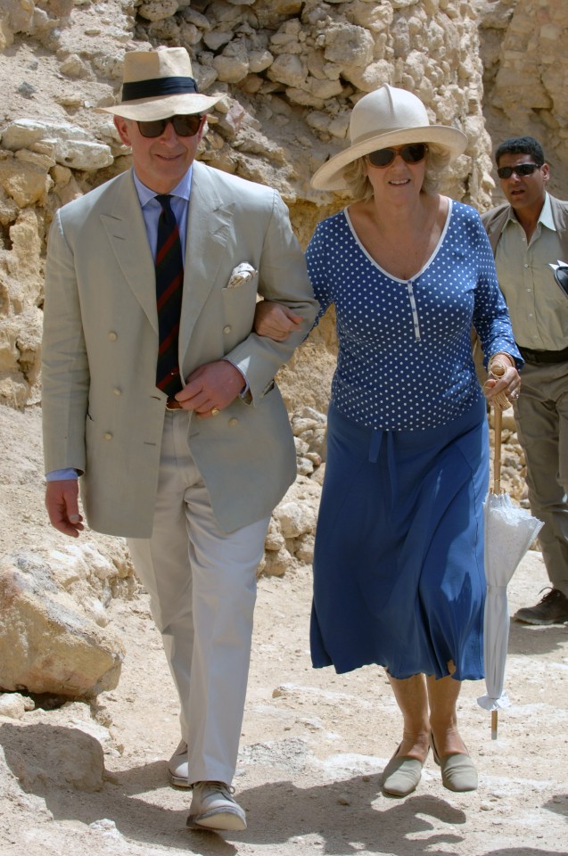 Prince Charles and Camilla visiting a temple.