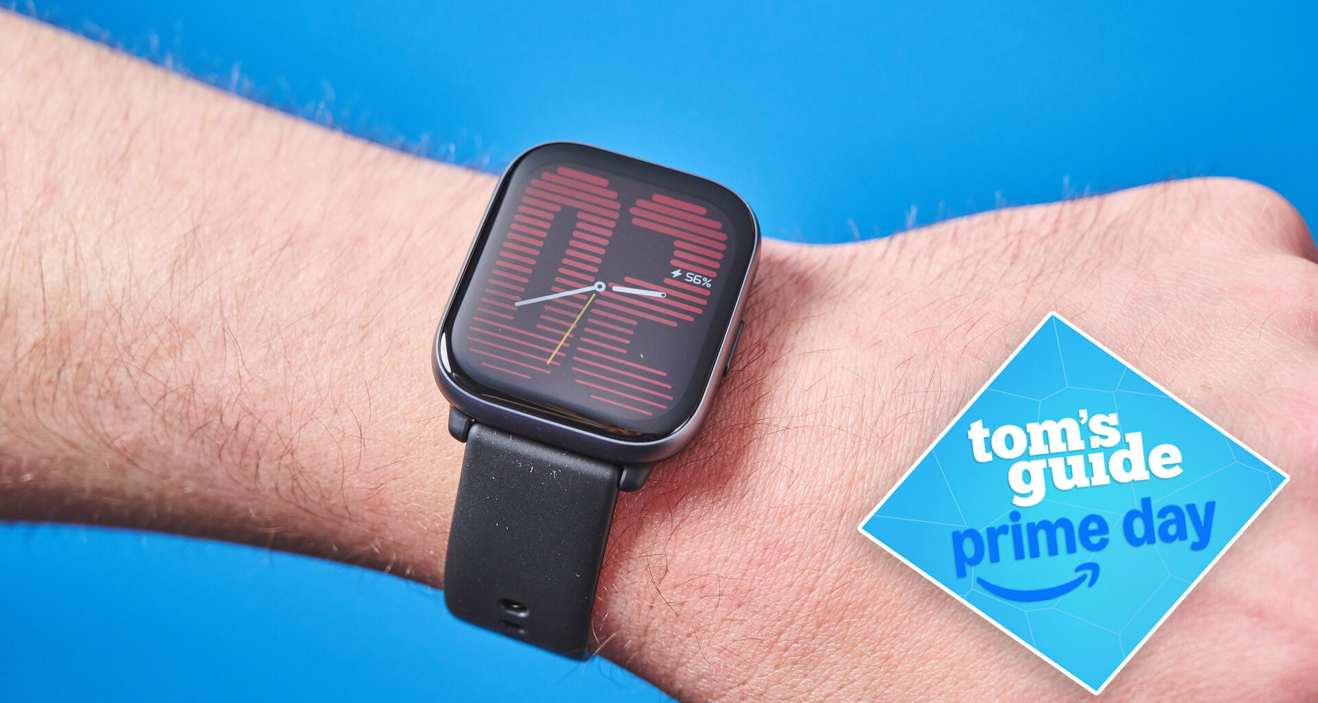The Amazfit Active on a person's wrist. A blue Tom's Guide Prime Day deals tag is in the bottom right-hand corner of the image.