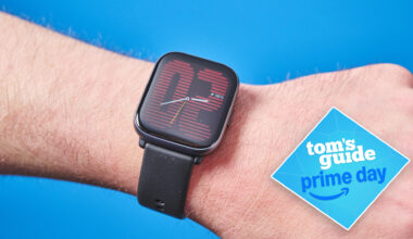 The Amazfit Active on a person's wrist. A blue Tom's Guide Prime Day deals tag is in the bottom right-hand corner of the image.