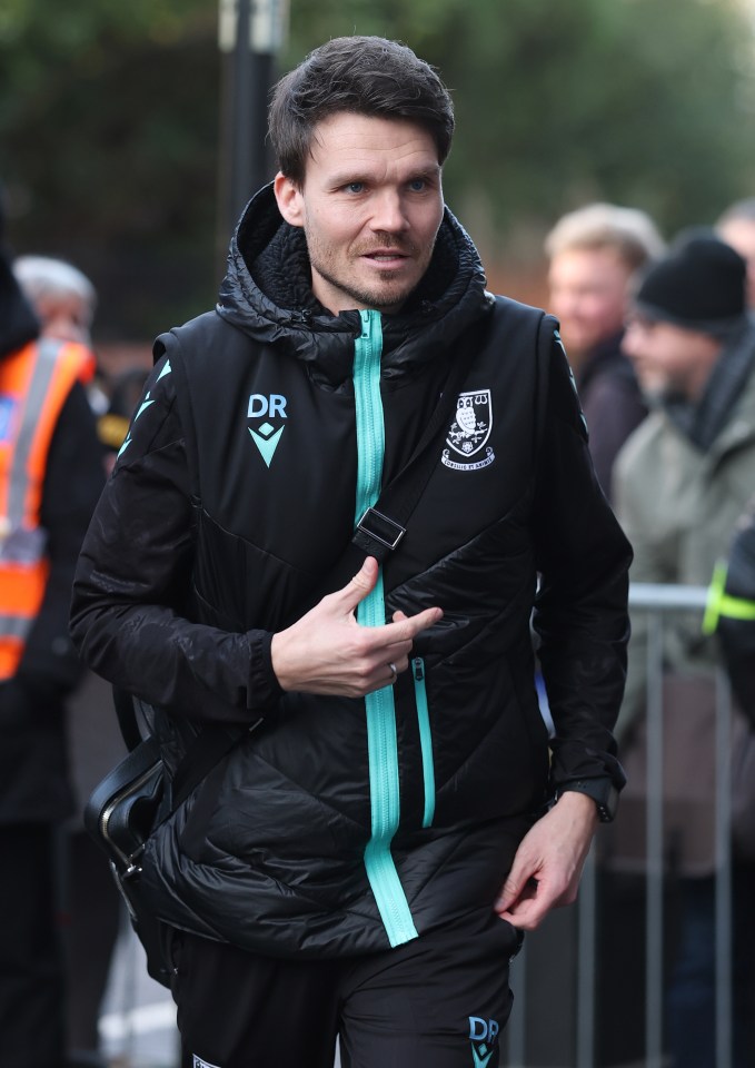 Danny Rohl, manager of Sheffield Wednesday, arrives at a soccer match.