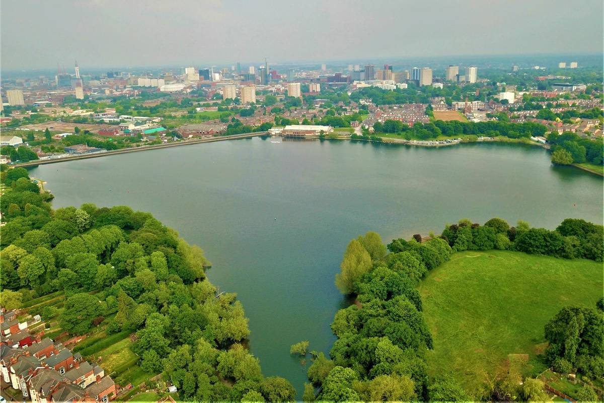Aerial photo of Edgbaston Reservoir, Birmingham, surrounded by green spaces