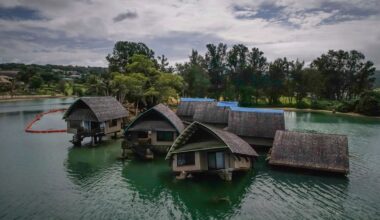 The once iconic Holiday Inn villas in Port Vila, Vanuatu, sit partially sunken Saturday, July 19, 2025, after being hit by multiple cyclones and an earthquake that caused irreparable damage. (AP Photo/Annika Hammerschlag)