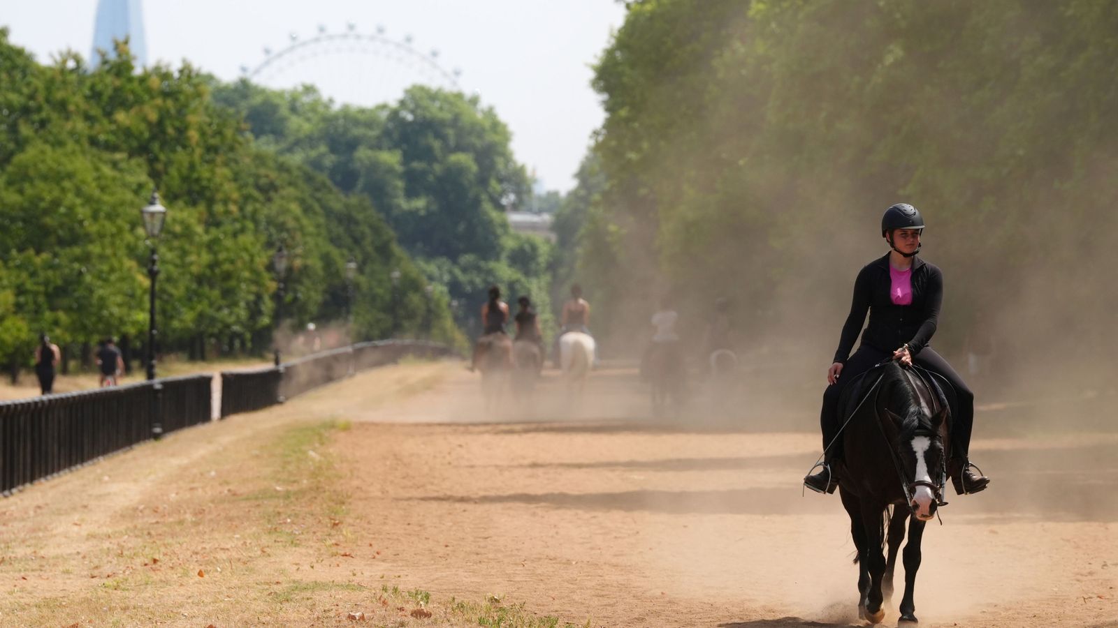 PA Best People on horseback in the dry conditions in Hyde Park in London. More sweltering temperatures are forecast for southern and eastern parts of England on Tuesday after highs of more than 33C rounded off June. Picture date: Tuesday July 1, 2025. PA Photo. Photo credit should read: Jonathan Brady/PA Wire