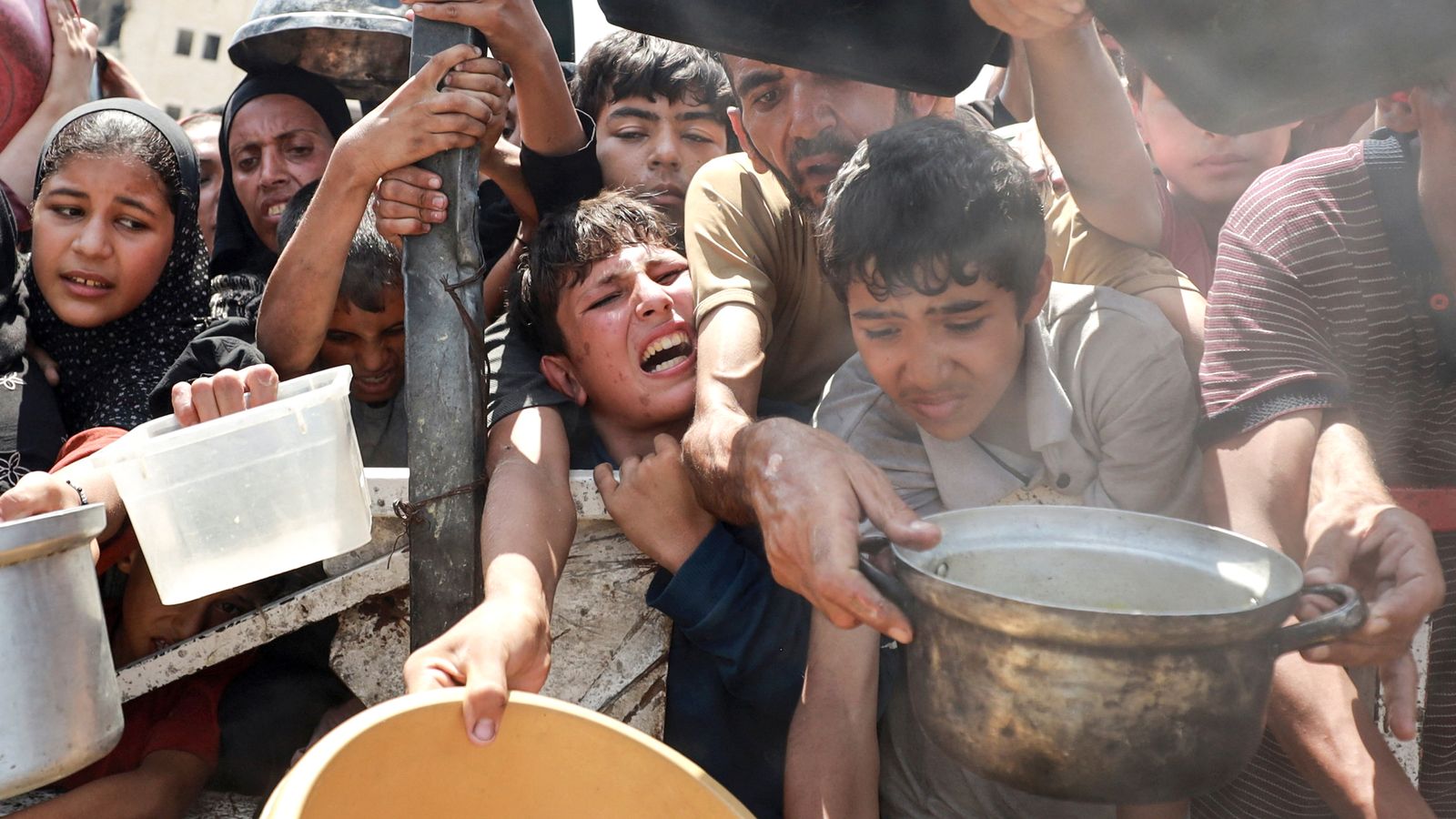 Gaza latest: 'Children are passing out from hunger' - US doctor in Gaza sounds alarm on starvation crisis | World News