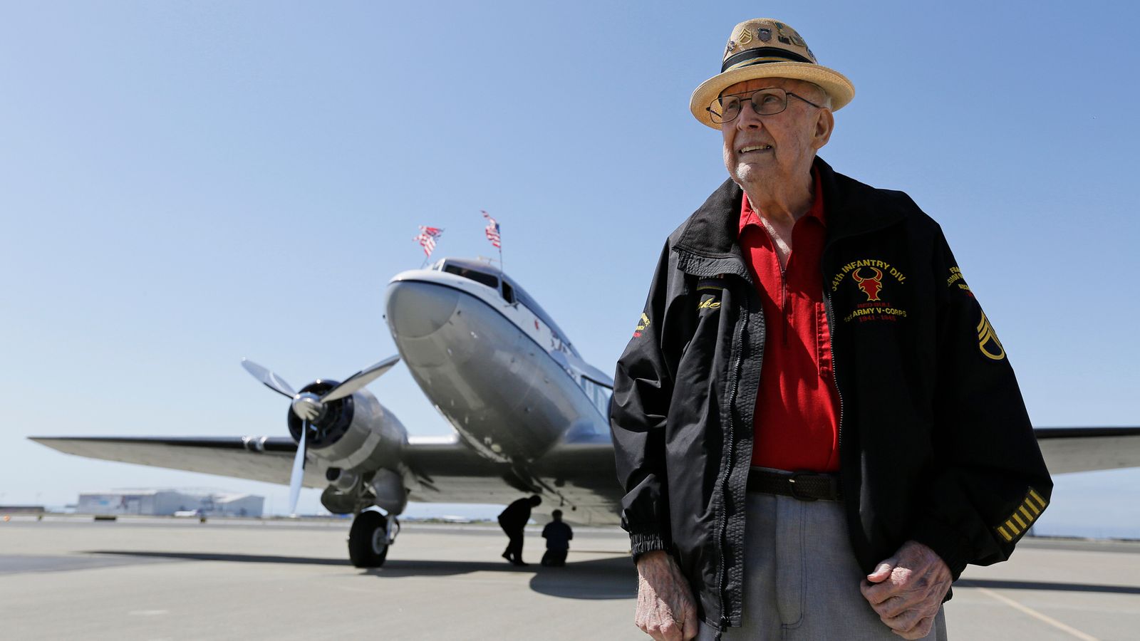 Larson poses before going for a ride in the "The Spirit of Benovia" World War II-era aircraft in Oakland, Calif. Pic: AP