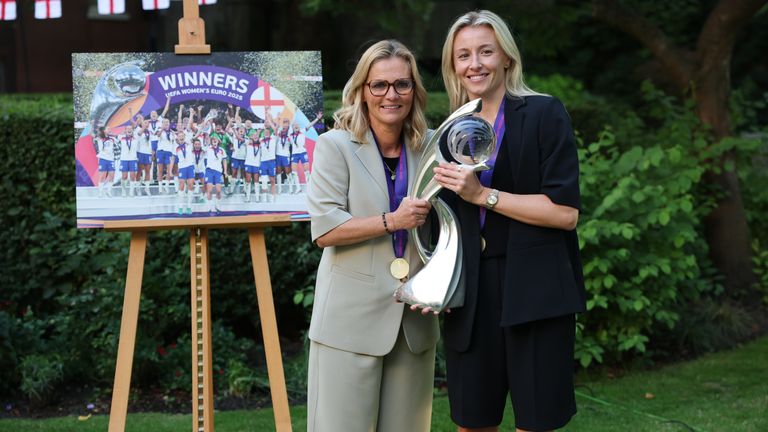 Sarina Wiegman and Leah Williamson with the trophy as she and members of the England team attend a reception at Downing St. Pic: PA 
