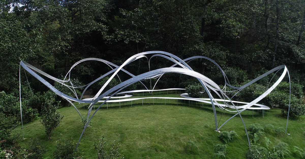 steel arcs blossom into kong xiangwei studio's theater in china