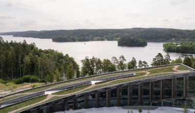 snøhetta's wendelstrand lakehouse resembles a moss-covered spine