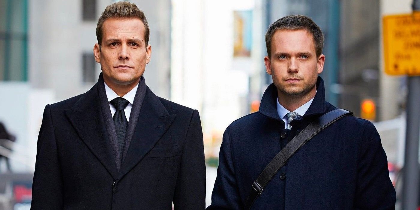 Harvey (Gabriel Macht) and Mike (Patrick J. Adams) walking together outside in Suits Season 6