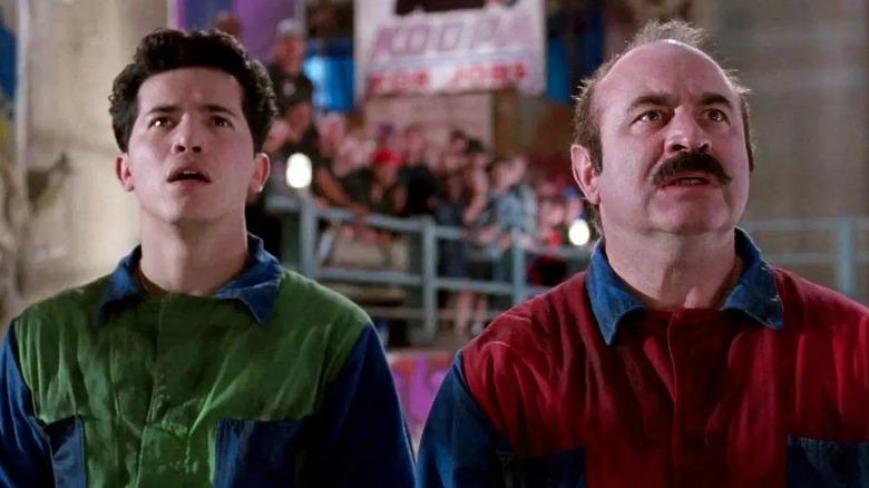 John Leguizamo as Luigi and Bob Hoskins as Mario look scared in Super Mario Bros.
