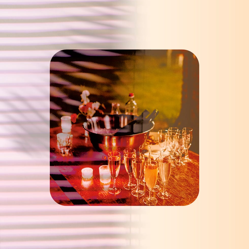 a festive table setup featuring drinks and a cooler